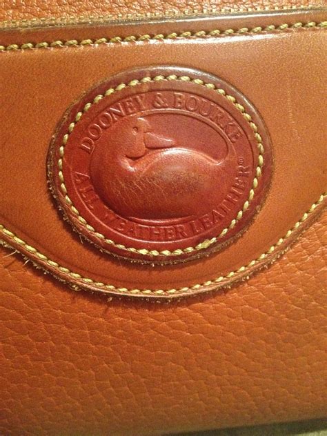 how to tell if dooney and bourke purse is real